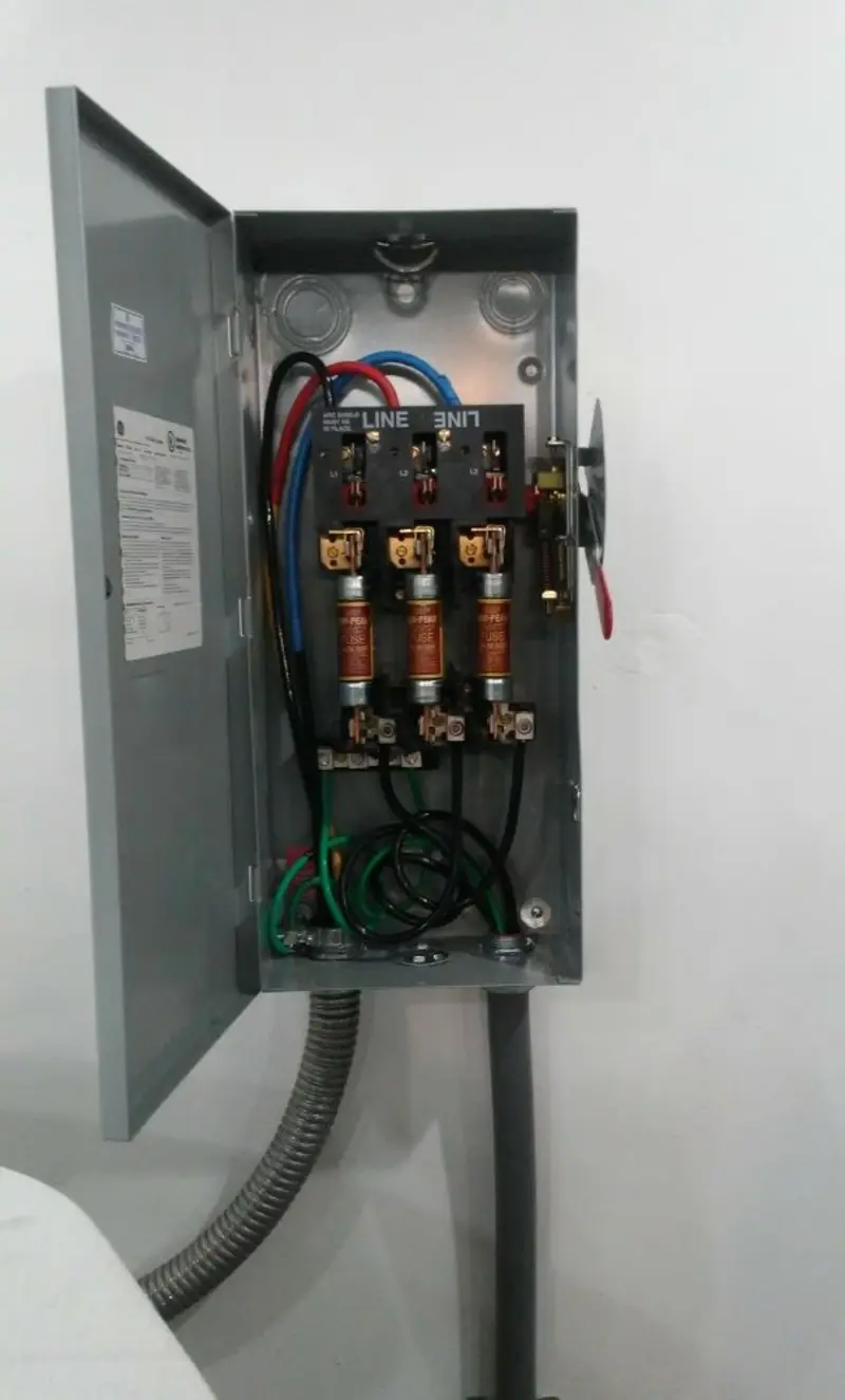 Three-phase disconnect switch installed for Smoke Detector Installation in Wilmore